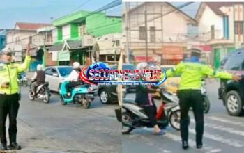 Polisi Atur Arus Lalu Lintas di Jalan Raya Kadungora Garut, Pengendara Diimbau Tertib Berkendara