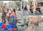Babinsa Joyotakan Bantu Siswa Menyeberang, Arus Lalu Lintas di Depan SDN 59 Tetap Lancar
